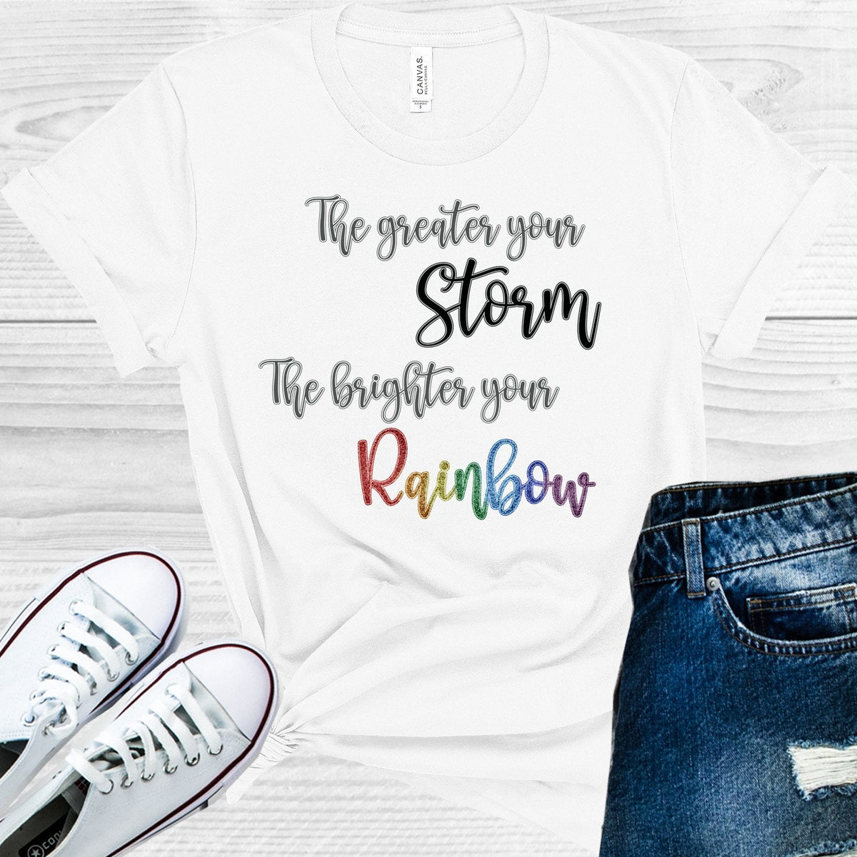 The Greater Your Storm Brighter Rainbow Graphic Tee product image 1